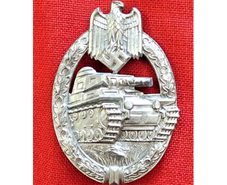 WW2 German Army/SS Panzer Assault badge in silver by Hermann Aurich of Dresden. Die struck example, with bright silver finish