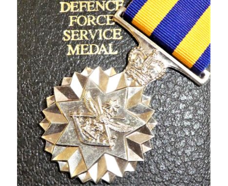 Australian Defence Force Service Medal set. Engraved named D.E. SHANAHAN R.120948. In award case with miniature &amp;amp; rib