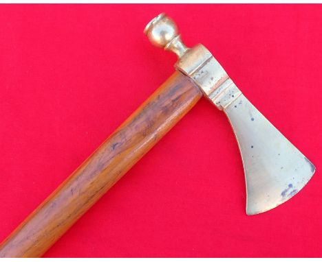 Replica Indian Tomahawk peace pipe. Features brass metal 15cm by 5.6cm long tomahawk head, edge has nicks, with minor tarnish