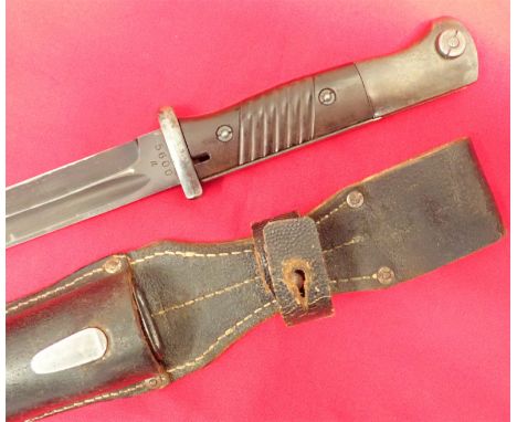 WW2 German K98 Mauser matching numbered bayonet and scabbard. Bakelite grips, good amount of blue finish (60%) to metal work,