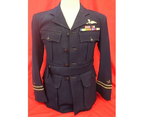 WW2 Royal Australian Airforce Officers Jacket. Blue wool jacket, with economy buttons, belt fittings, Fl. Lt rank &amp;amp; b