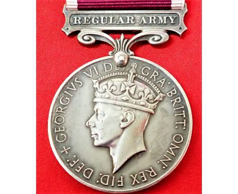 British Army Long Service &amp;amp; Good Conduct Medal, GVI, type 2. Impressed named 4267423 B.Q.M.S. A. LAVERICK. R.A., regi