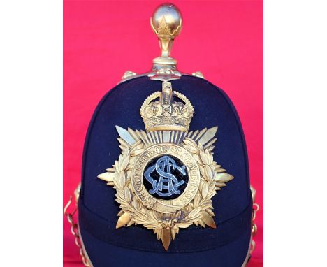1902 – 1918 era 1878 pattern British Army officer’s blue cloth ‘Home Service’ helmet to the Army Service Corps. Blue cloth fe
