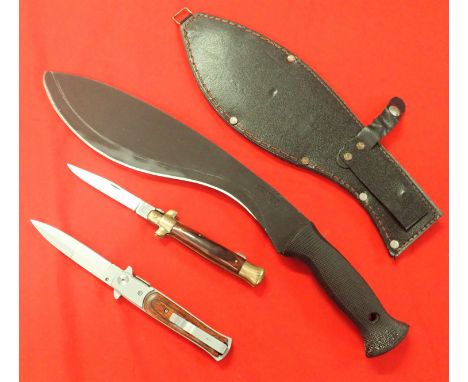 Large Cold Steel Kukri &amp;amp; 2 folding knives (3). Kukri features rubber hatched grip with parkerized black coated blade 