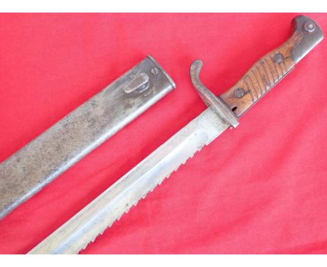 WW1 98/05S pattern German ‘Sawback’ butcher bayonet and scabbard by Ankerwerke. Good wooden grips, with ‘butcher’ blade and v