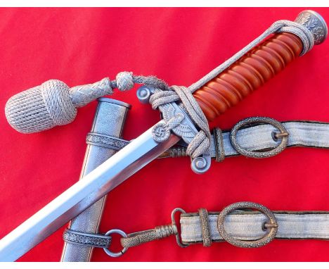 WW2 Nazi Germany Army officer’s dagger, scabbard, knot and hanger by Carl Eickhorn of Solingen. Features excellent pommel cap