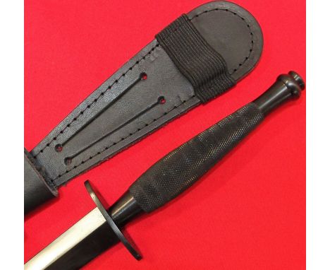 2nd pattern Fairbairn Sykes commando dagger and scabbard. Black enamel ribbed 2nd pattern type ‘hatched’ grip, maker marked f