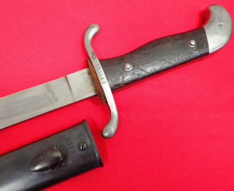 1909 pattern Argentine short sword bayonet and scabbard by WKC. Matching numbered German contract military machete. Wooden gr