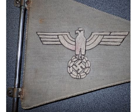 WW2 German Army officer’s car pennant flag. 21cm x 30cm faded field grey ribbed cotton triangular flag, with twist cotton bor