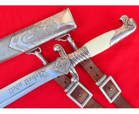 WW2 German R.A.D. leaders’ hewer/dagger and scabbard with hanger by Wusthof. Features detailed hilt with eagle’s head pommel 