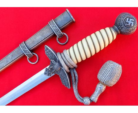 WW2 German/Luftwaffe officer’s 2nd pattern dagger, scabbard and knot by Anton Wenger Jr. Features white celluloid grip, with 