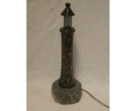 A Cornish serpentine table lamp in the form of a lighthouse, 16½" high