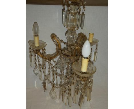 A good quality cut glass three-branch ceiling light with glass lozenge/droplet decoration