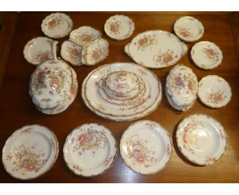 A late Victorian pottery part dinner set with floral transfer decoration comprising three various size tureens including a la