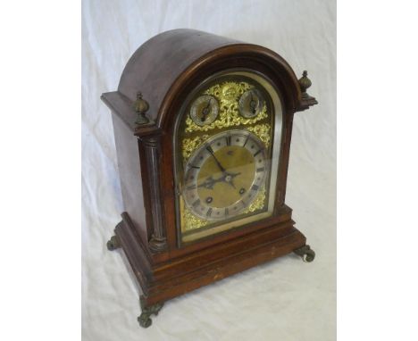 A good quality German bracket clock with gilt and silvered arched dial with two additional subsidiary dials in brass mounted 