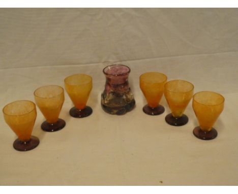 A set of six Daum Nancy glass orange and purple tinted goblets and an Art Glass purple tinted tapered spill vase (7)