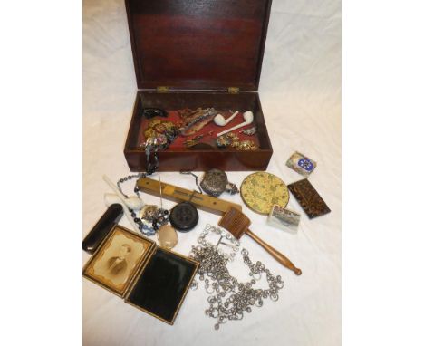 A jewellery box containing various costume jewellery together with brass mounted spirit level, soapstone figure and collectab