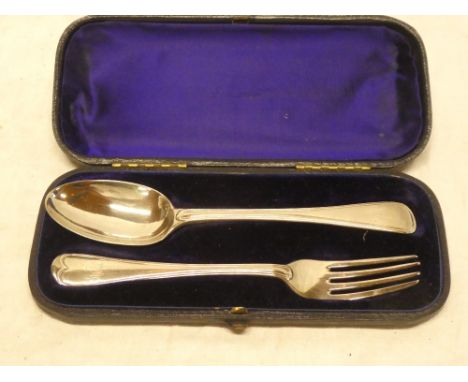 A Victorian silver spoon and fork with engraved initials in velvet lined case, London marks 1890/93