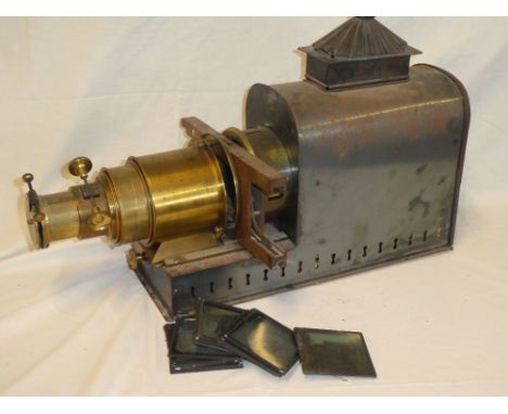 A Victorian brass mounted and painted metal magic lantern slide projector together with a selection of unusual Bovril adverti