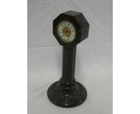An old mantel clock in red veined Cornish serpentine tapered case, 10" high (af)