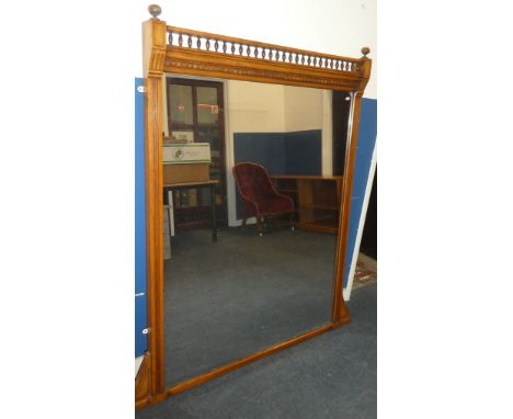 A Victorian rectangular over mantel mirror in rectangular oak frame with bobbin turned decoration, 62" high x 55" wide