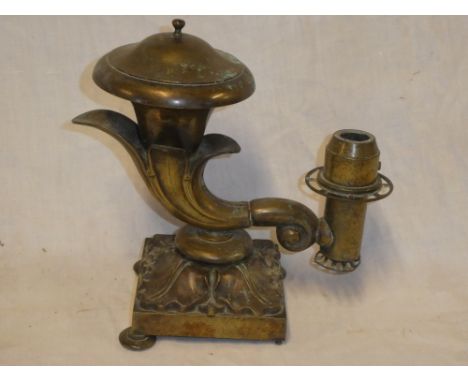 A 19th Century oil/candle lamp of cornucopia form on square shaped base