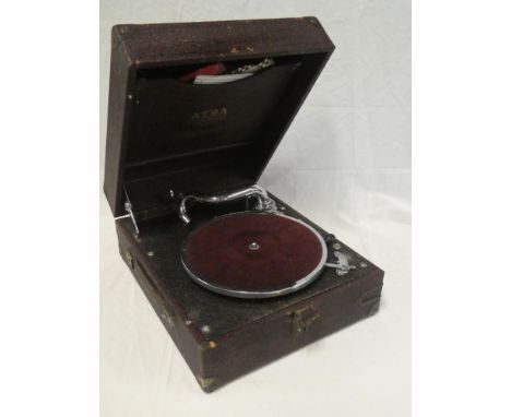 An old Alba "Eight O Eight" portable table top gramophone with chromium plated mounts in mottled snakeskin-effect case