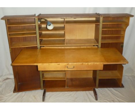 A 1960's Danish "Magic Box" folding desk by Mummenthaler &amp; Meier with fitted compartments, folding desk and central drawe