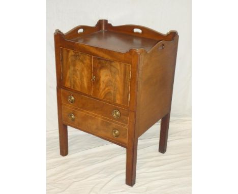 A 19th Century walnut square commode chest with cupboard enclosed by two panelled doors above two false drawers, the top with