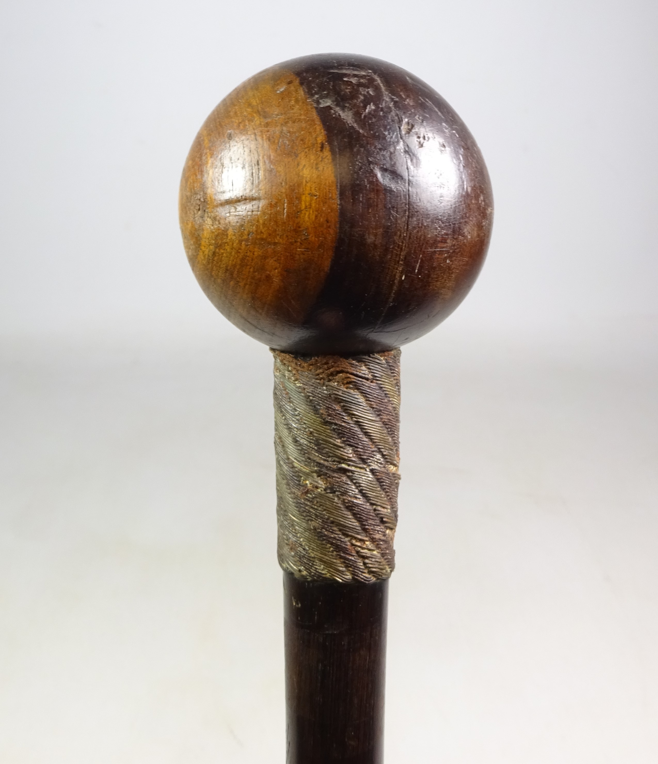 Zulu hardwood Knobkerrie with twotone wire bands to shaft, L79cm