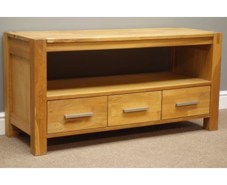 Solid light oak television stand fitted with three drawers, W111cm, H55cm, D42cm   Condition Report   Click here for further 