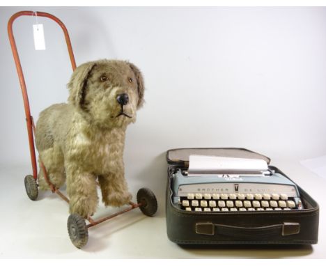 1960's Line Bros push along dog, H54cm and a vintage Brother De Luxe typewriter (2)   Condition Report   Click here for furth