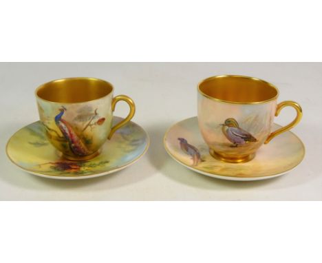 Early 20th century Royal Worcester cabinet cup and saucer hand painted with a Peacock in woodland setting, unsigned H6cm and 