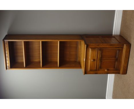Narrow 'Ercol' golden dawn finish elm bookcase on cupboard with drawer, W52cm, H197cm, D50cm   Condition Report   Click here 