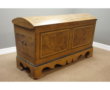19th century pine domed top storage chest with scumbled wood effects, large wrought metal carrying handles, on shaped apron a