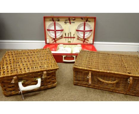 Three 1950's/ 60's picnic hampers; wicker 'Sirram' and two other sets (3)   Condition Report   Click here for further images,