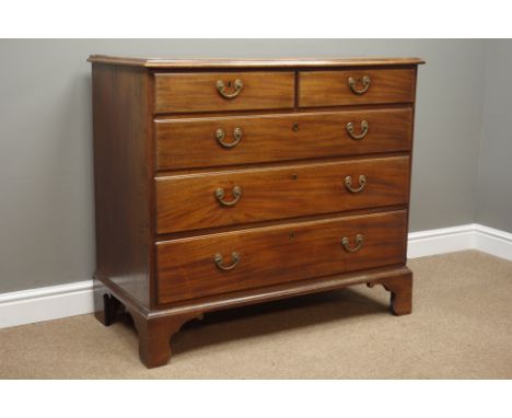Georgian figured mahogany chest, rectangular top with moulded edge, two short and three long graduating drawers, scrolled bra