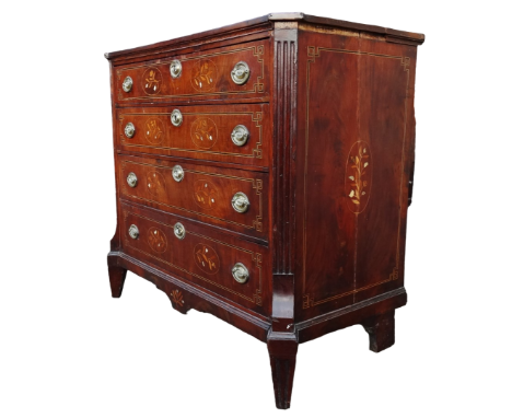 A late 18th century mahogany chest of drawers - the top inlaid with foliate oval panel incorporating mother-of-pearl and with