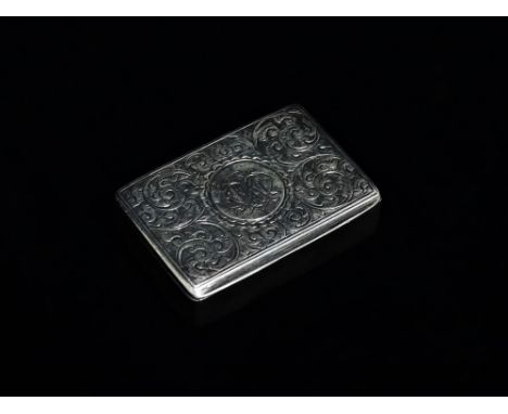 A silver snuff box - Birmingham 1896, George Unite, the rectangular top foliate engraved and with ownership initials, with a 