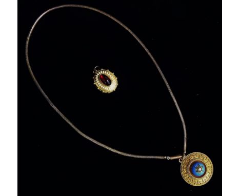 A Victorian gilt pendant - Etruscan style set with a pearl on light blue enamel button within a rope-twist border, vacant res