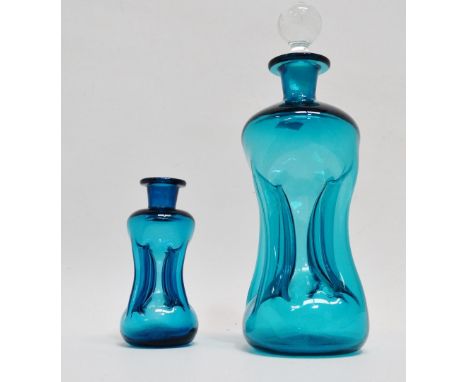 Holmegaard decanters - two Holmegaard blue glass 'Kluk Kluk' decanters, the largest with stopper, height 24cm. 