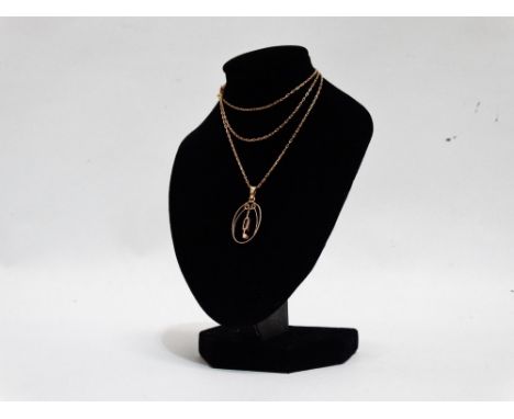 An Art Nouveau style 9ct gold, aquamarine and seed pearl pendant - on a 9ct gold fine link chain, weight 2.5g. 