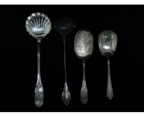 A white metal shell shaped ladle - possibly American, John Cox &amp; Co, engraved with ownership initials, together with thre