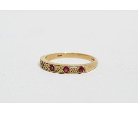 A five stone ruby and diamond dress ring - the gypsy set stones in a 9ct yellow gold band, size P/Q, weight 2.2g.