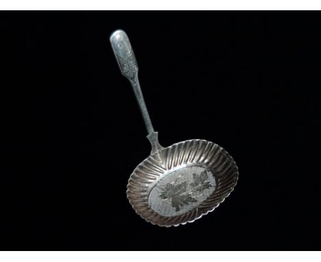 A silver caddy spoon - London 1896, Robert James Chaplin &amp; Sons, an engraved oval bowl, weight 12g.