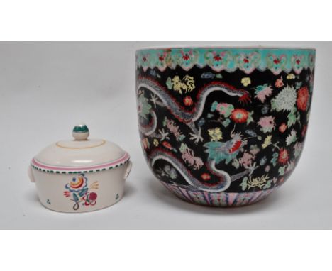 A Poole Pottery butter dish - floral decorated with lug handles, diameter 11cm, together with a Franklin Porcelain 'Celestial
