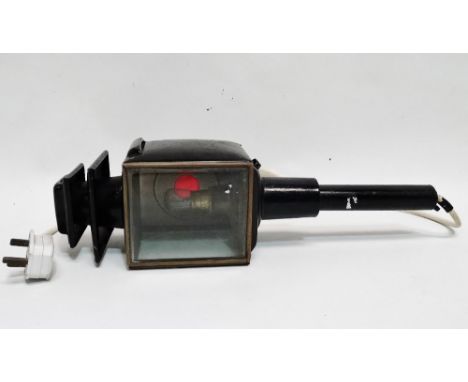 A late 19th century carriage lamp - black painted tin plate with brass fittings, incorporating two bevelled square glass pane