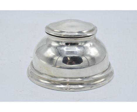 Large hallmarked silver inkwell with hinged lid. Birmingham 1927. 12cm widest diameter. No liner. Some engraving to the lid. 