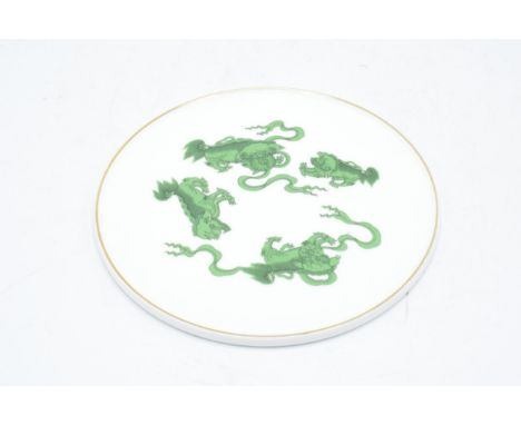 Wedgwood tea pot stand / ceramic coaster in the Chinese Tigers design. 19.5cm diameter. In good condition with varying levels