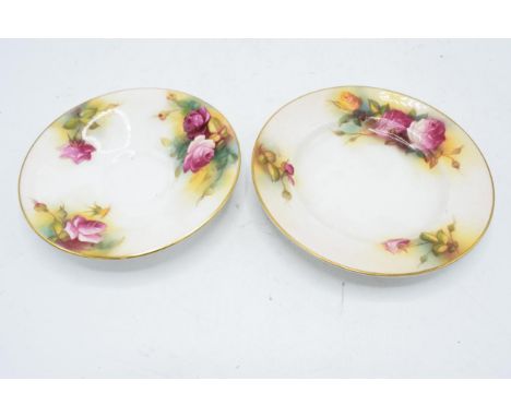 A collection of Royal Worcester items to include a saucer (1936) and side plate (1938) decorated with roses signed by Millie 